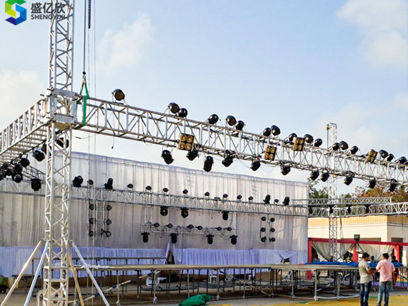 Why do we use stage trusses in weddings?